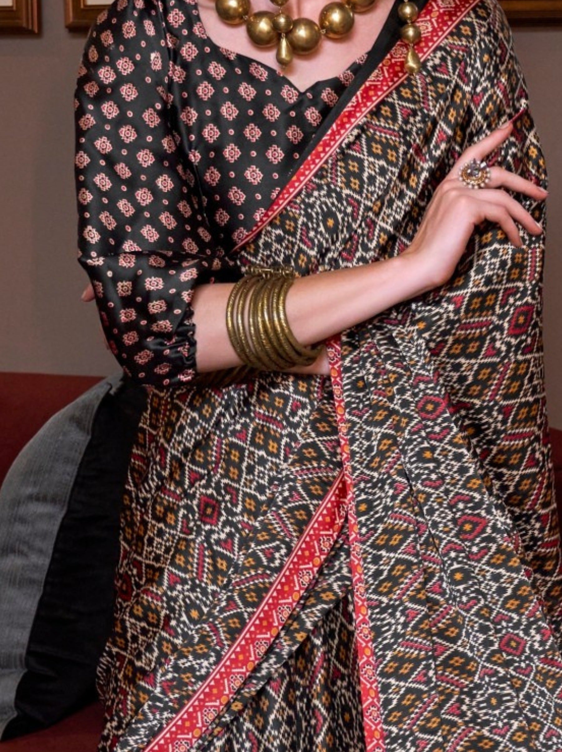 Black Satin Crepe Patola Party Saree - TrendOye