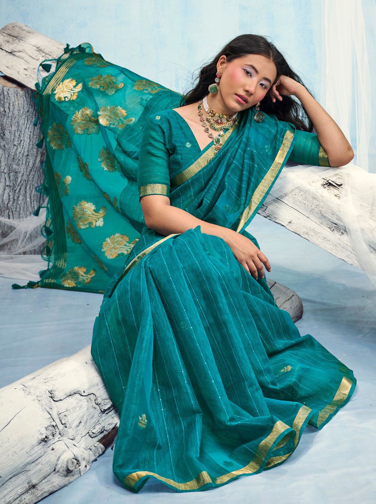 Teal Blue Premium Munga Silk Ethnic Saree With Tassels