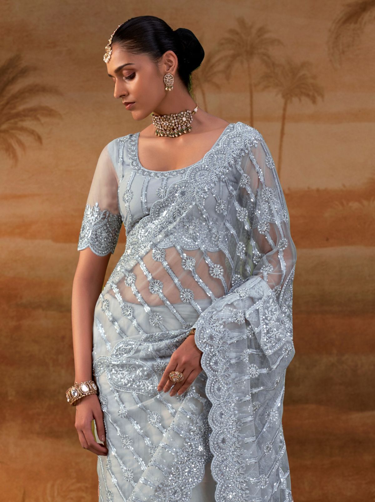 Powder Blue Premium Net Saree with Heavy Embroidery & Zarkan Work