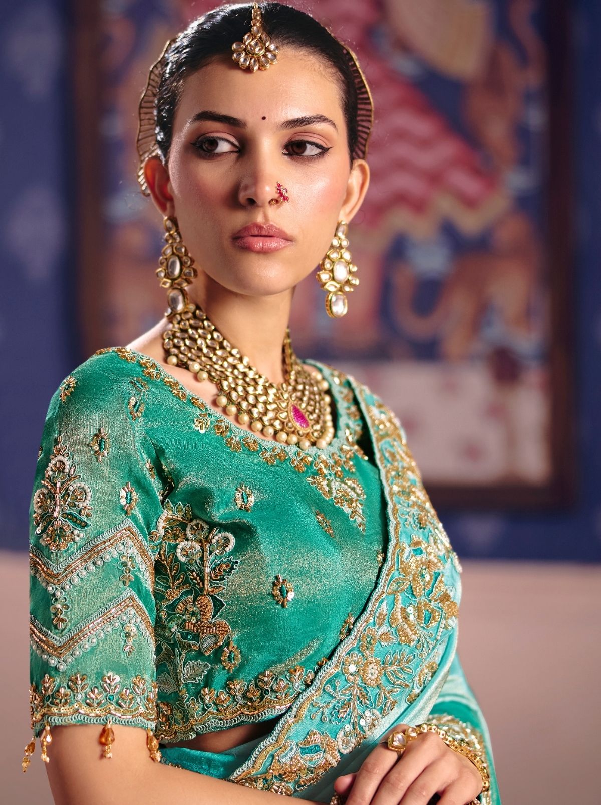 Turquoise Blue Tissue Silk Saree with Luxurious Zari & Embroidered Border