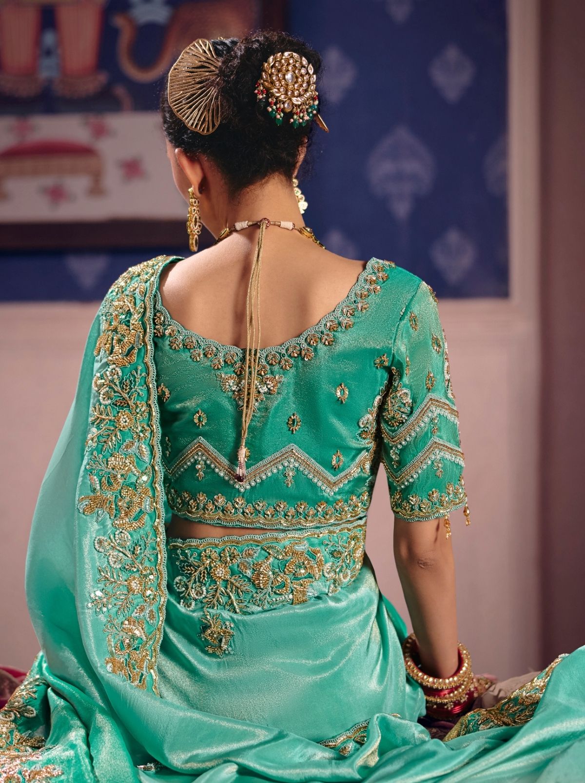 Turquoise Blue Tissue Silk Saree with Luxurious Zari & Embroidered Border