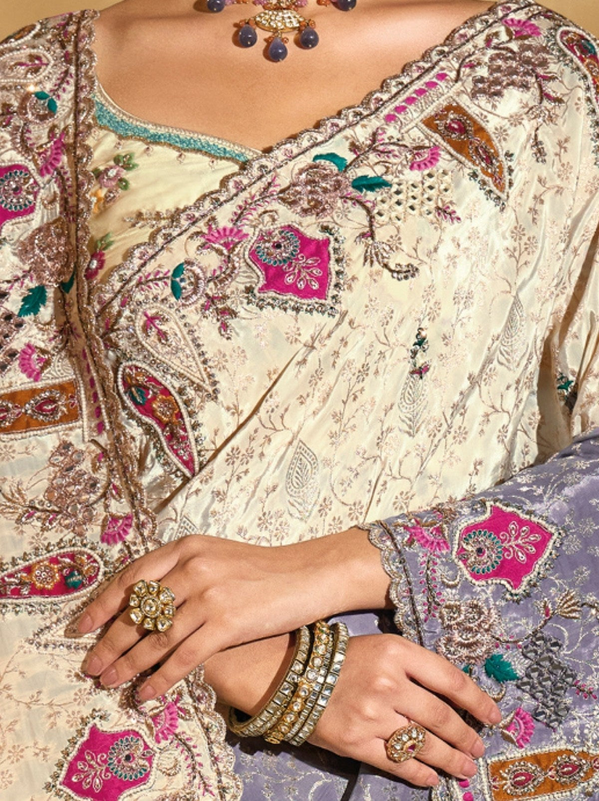 Cream-Purple Designer Crepe Silk Saree With Heavy Zari Work