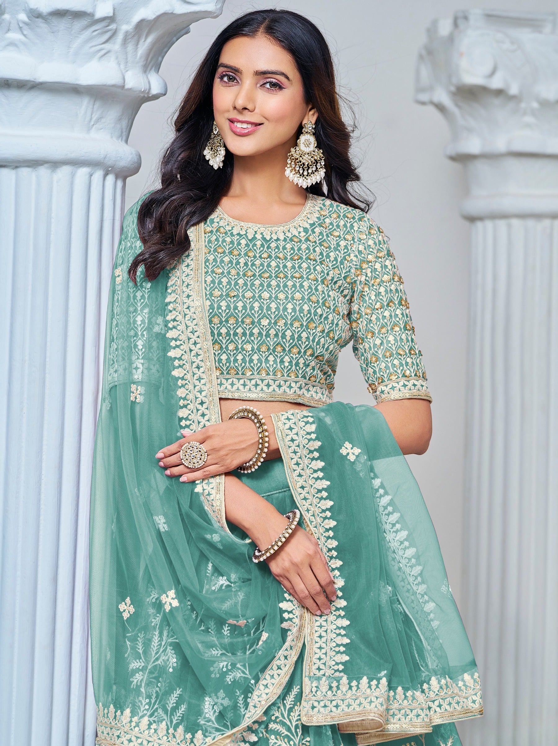 Elegant Mint Green Net Lehenga Set With Thread And Sequin Work - TrendOye
