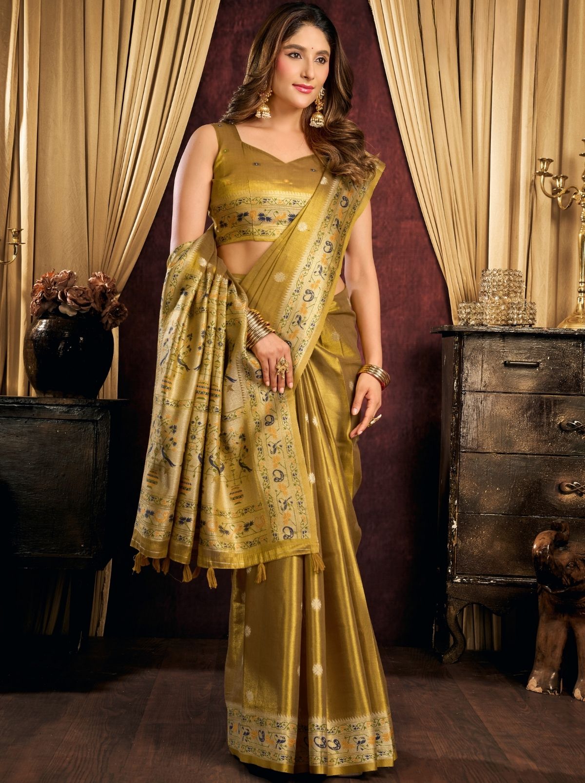 Olive Green Tissue Silk Saree with Soft Zari & Tassels