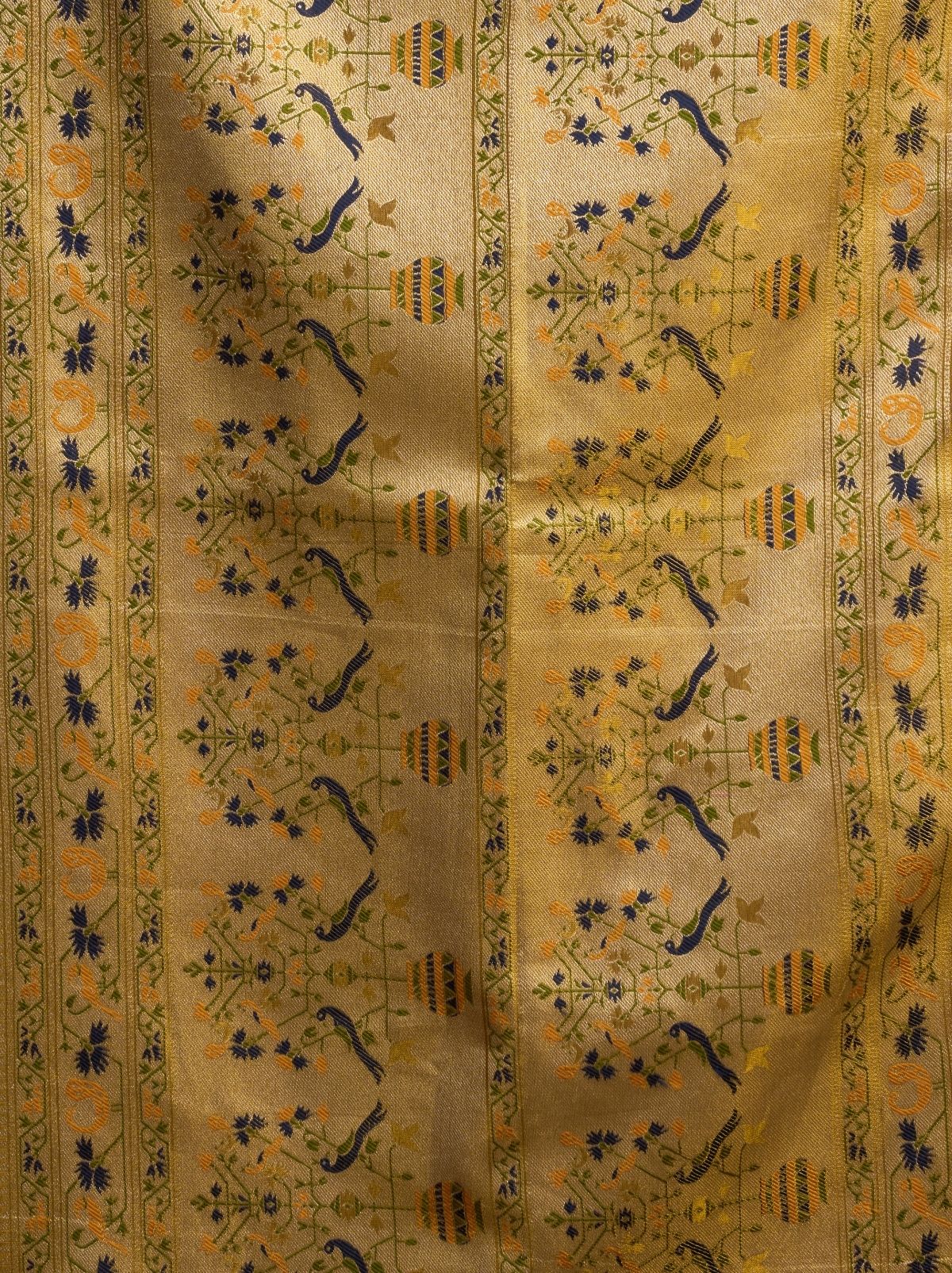 Olive Green Tissue Silk Saree with Soft Zari & Tassels
