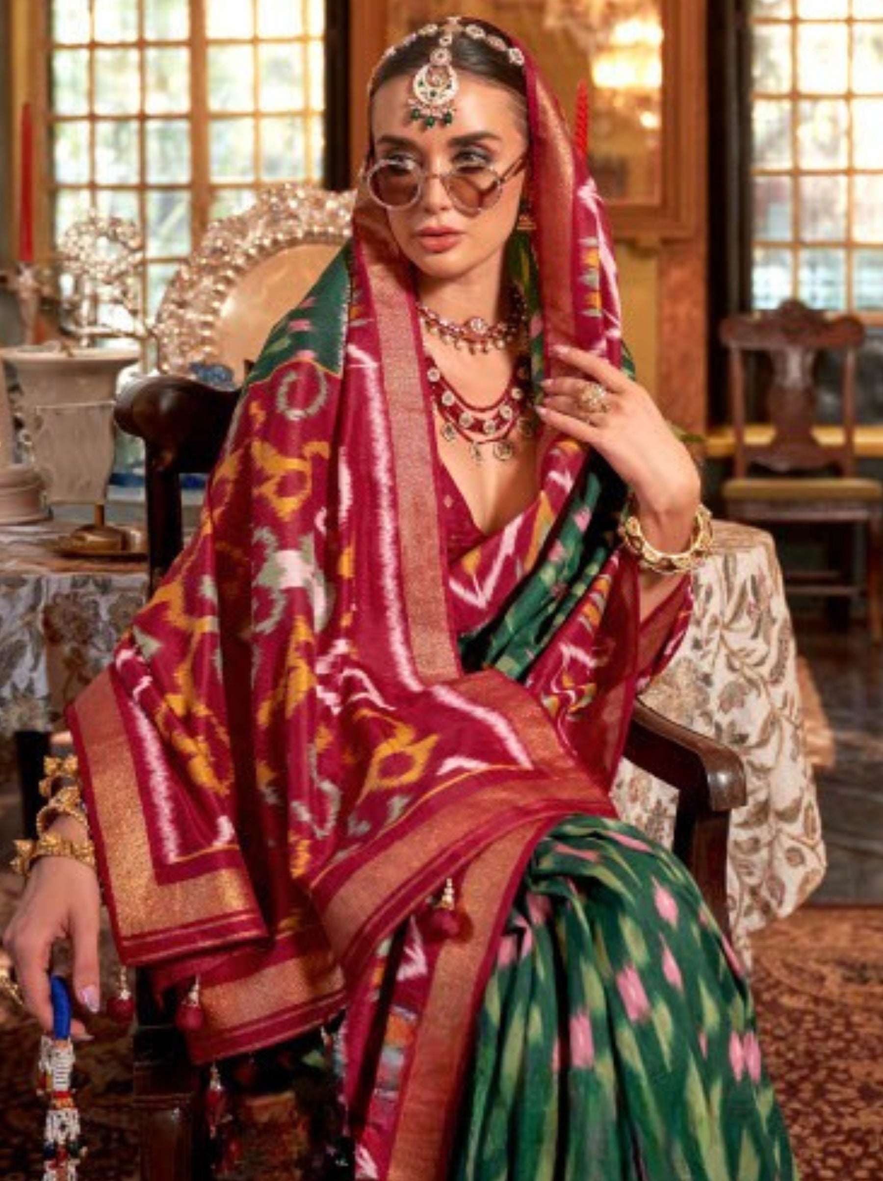 Sacramento Green Vibrant Patola Silk Festive Saree - TrendOye