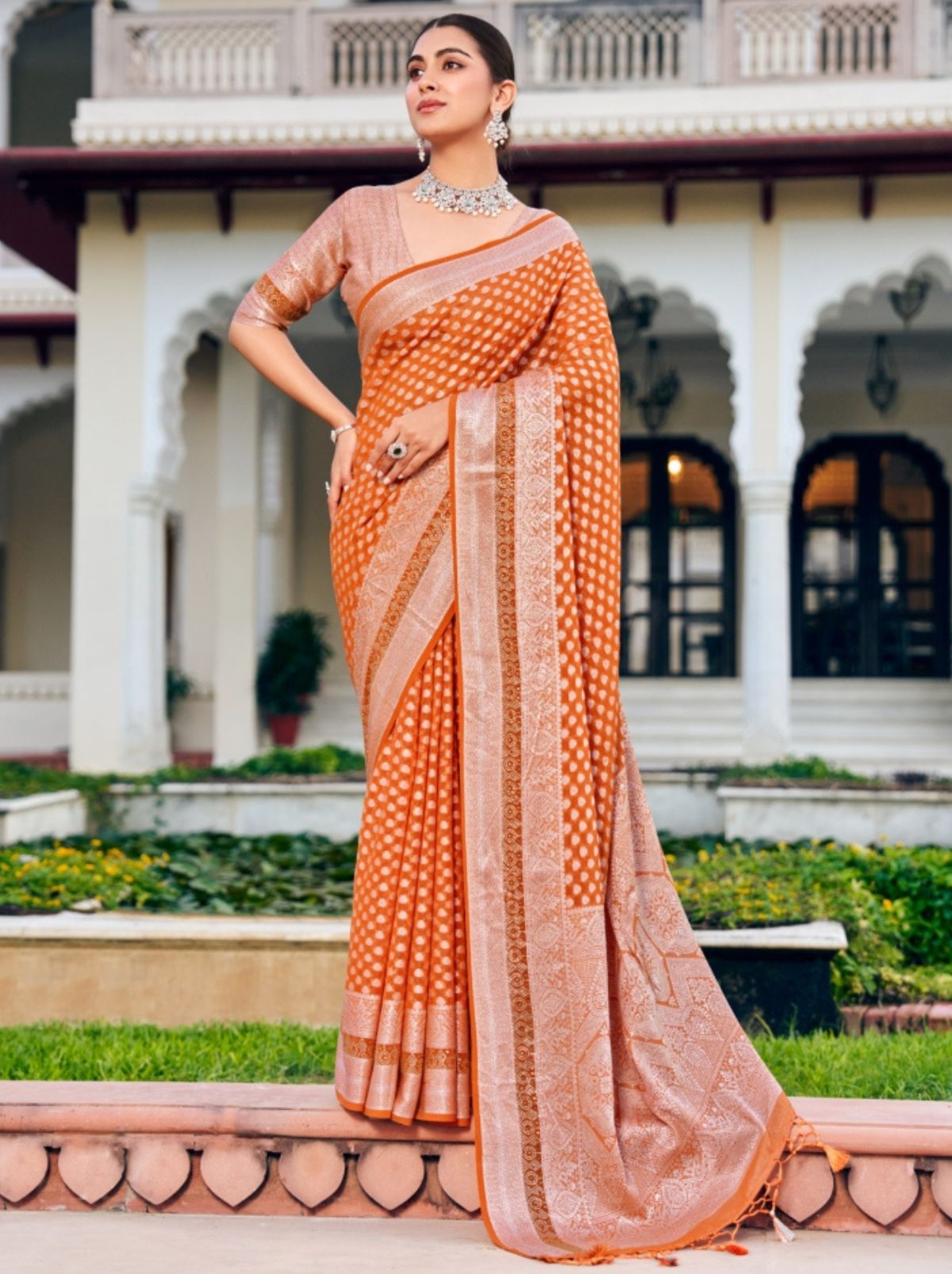 Carrot Orange Premium Georgette Saree With Weaved Motifs