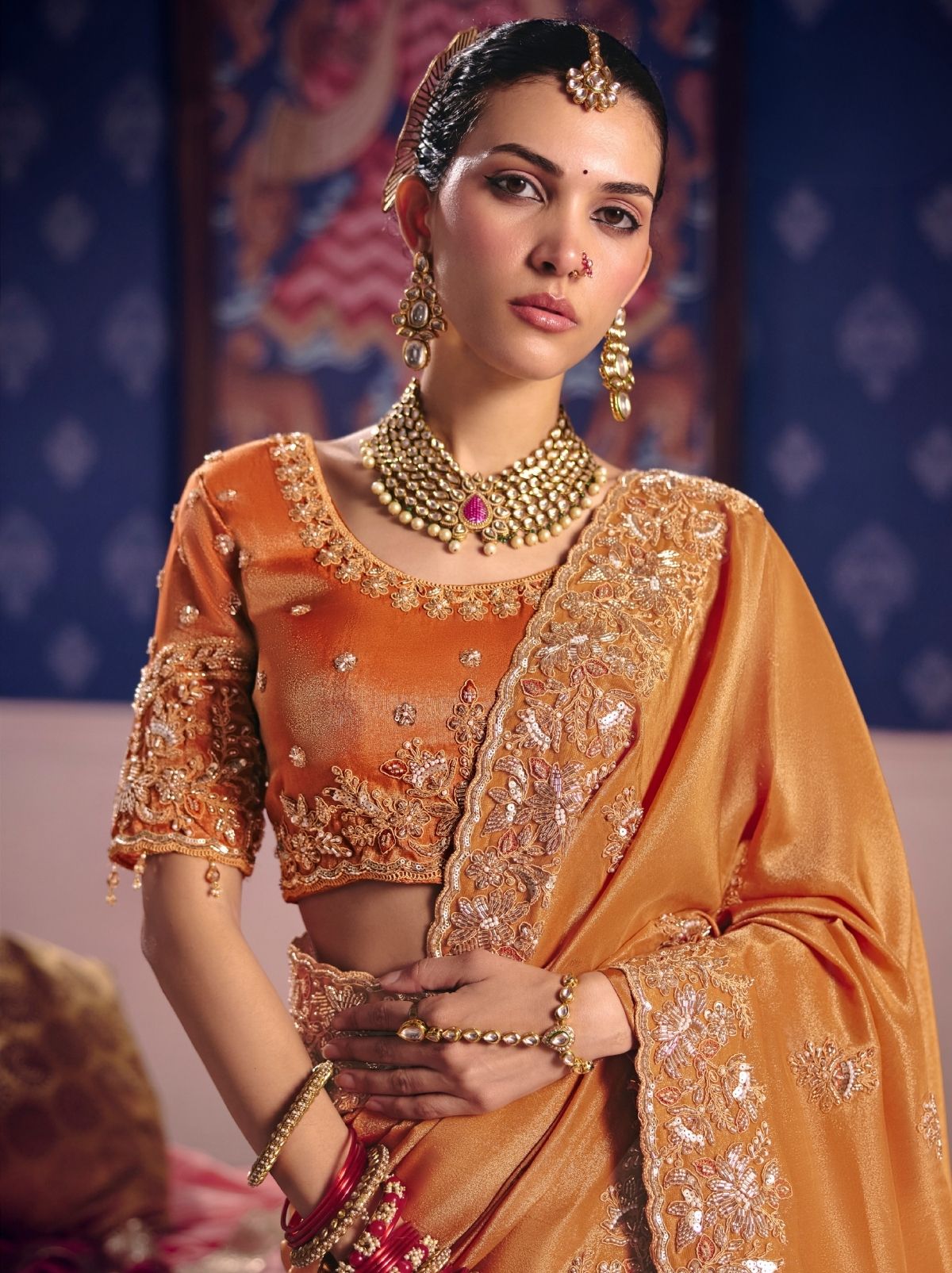 Sandstone Orange Tissue Silk Saree with Luxurious Zari & Embroidered Border