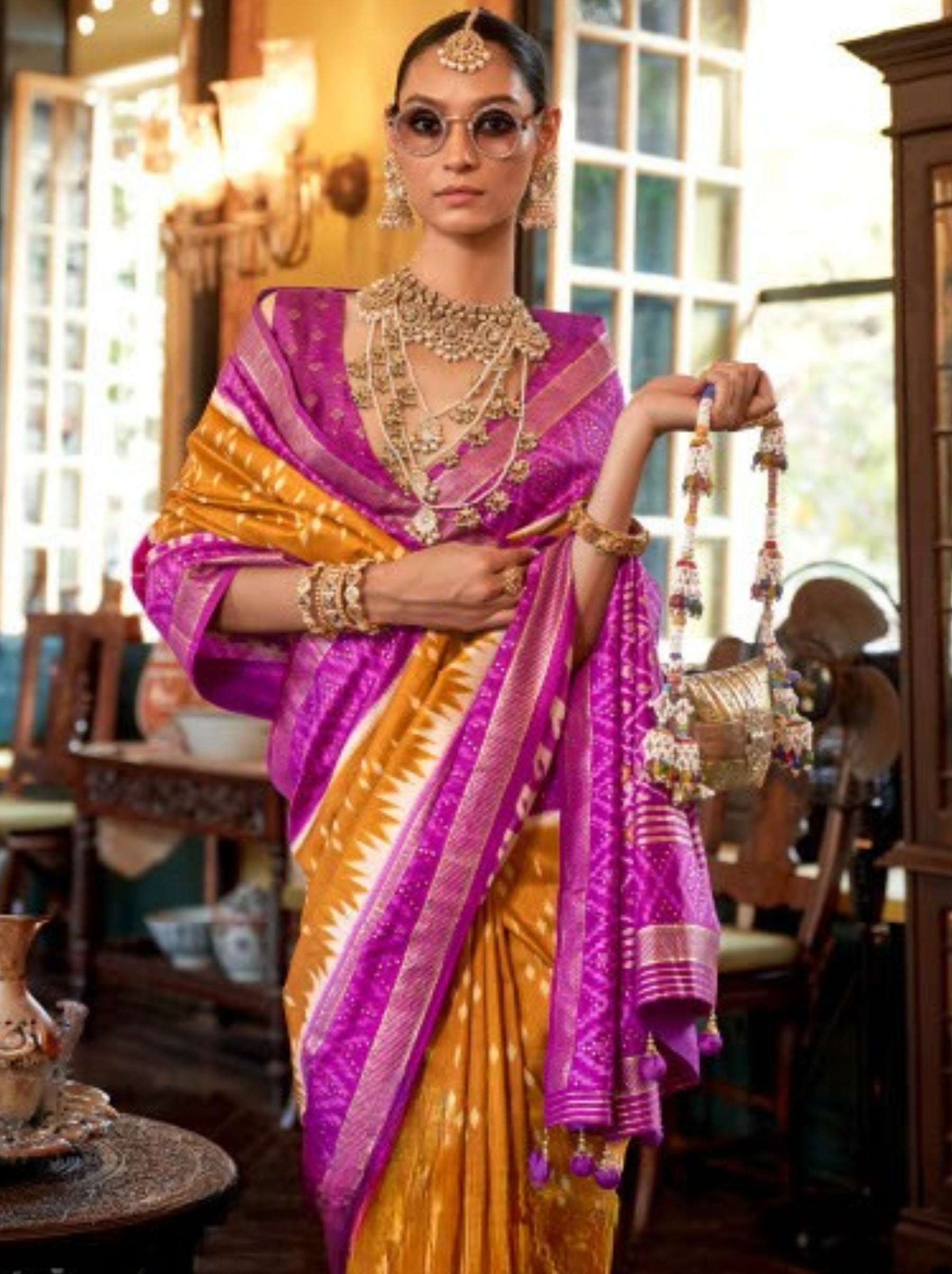 Carrot Orange Vibrant Patola Silk Festive Saree - TrendOye