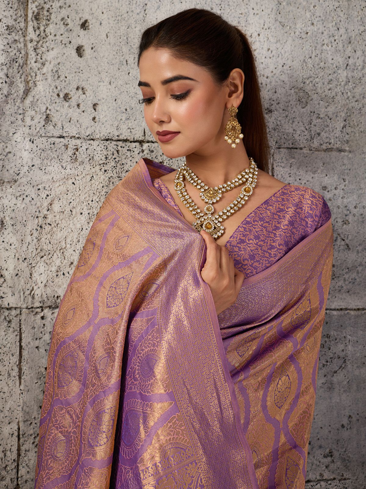 Plum Purple Kanjivaram Silk Saree With Intricate Gold Zari