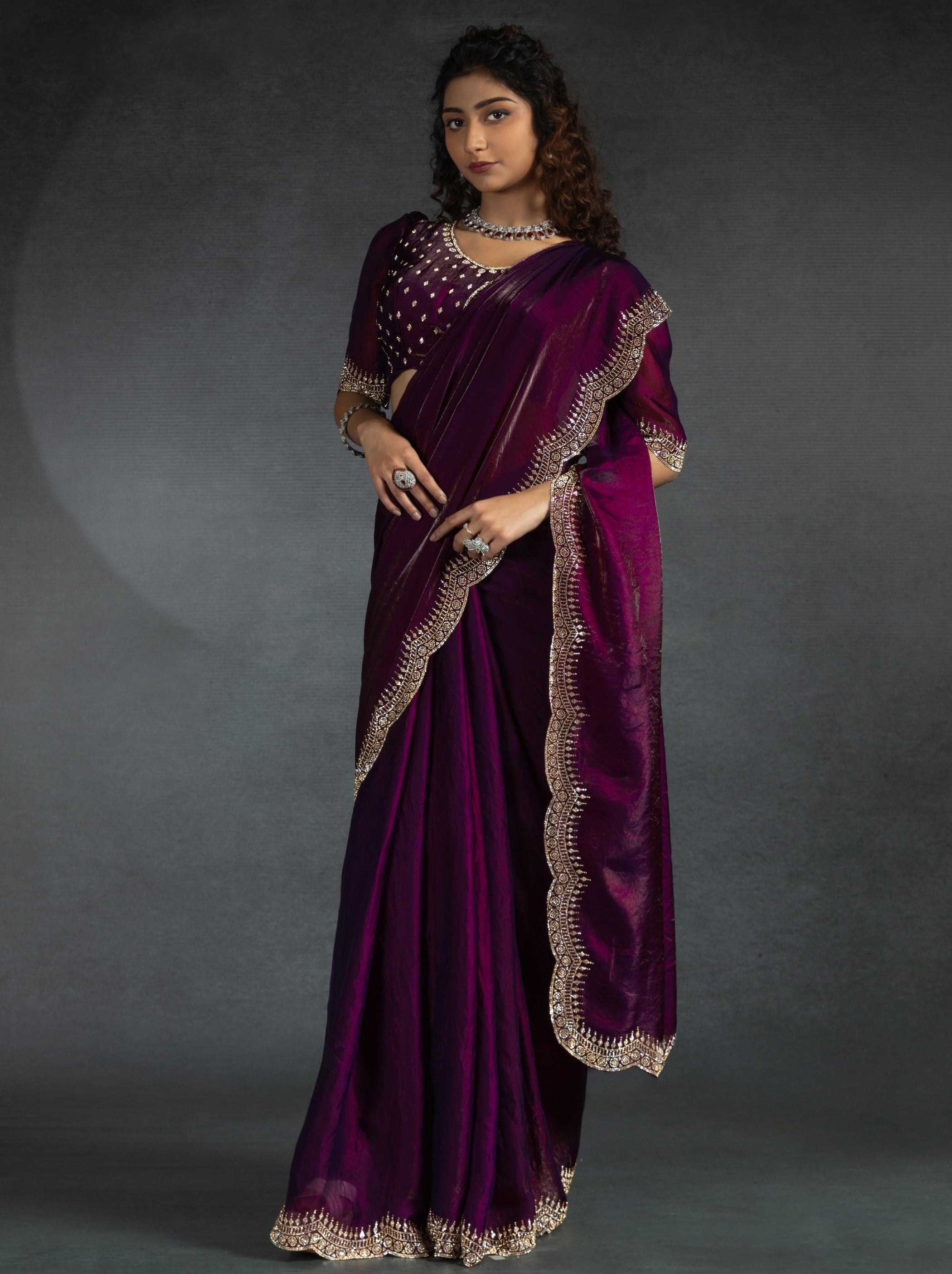 Wine Purple Satin Silk Party Saree Embellished With Zircon Handwork On Border - TrendOye