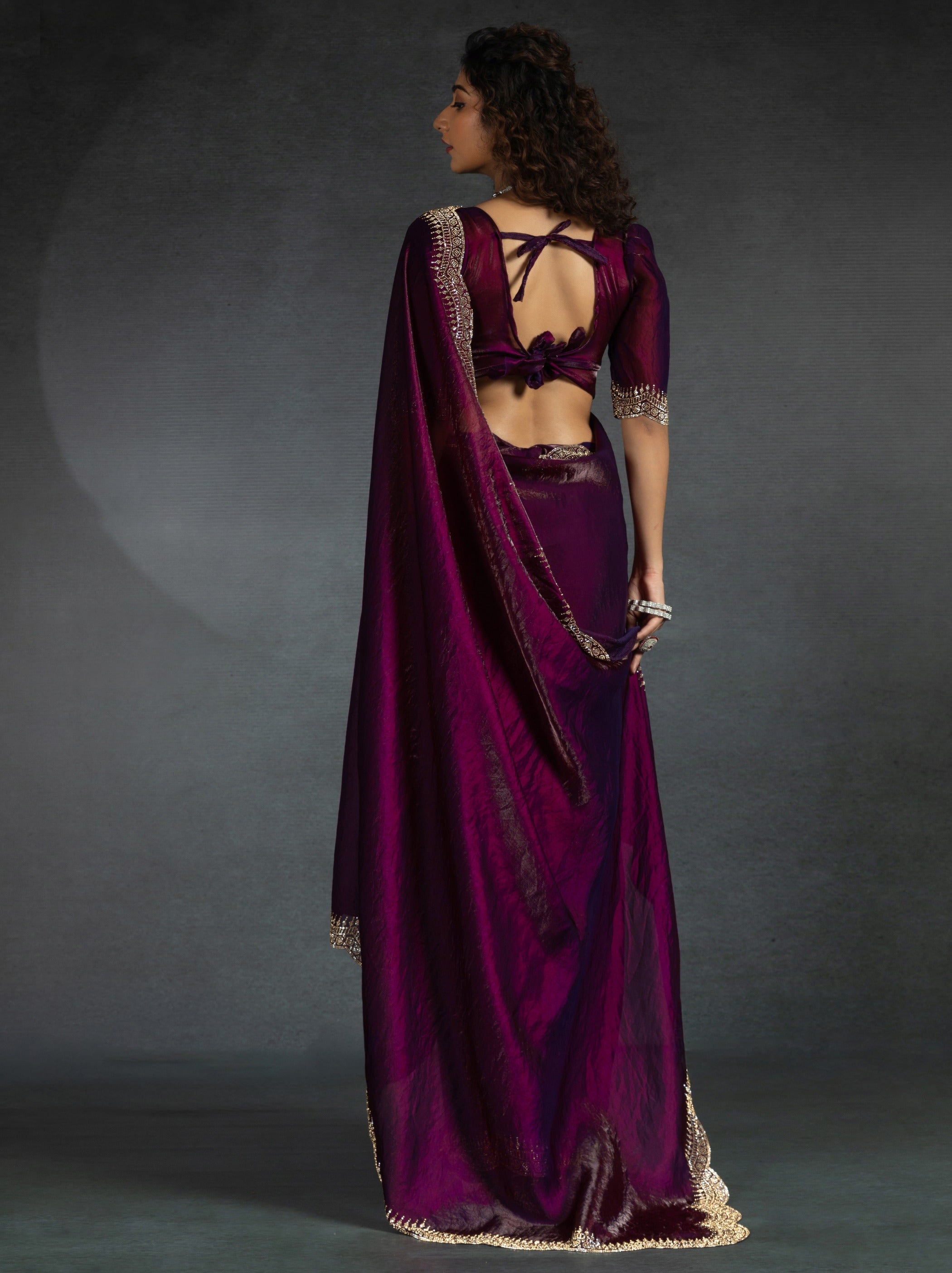 Wine Purple Satin Silk Party Saree Embellished With Zircon Handwork On Border - TrendOye
