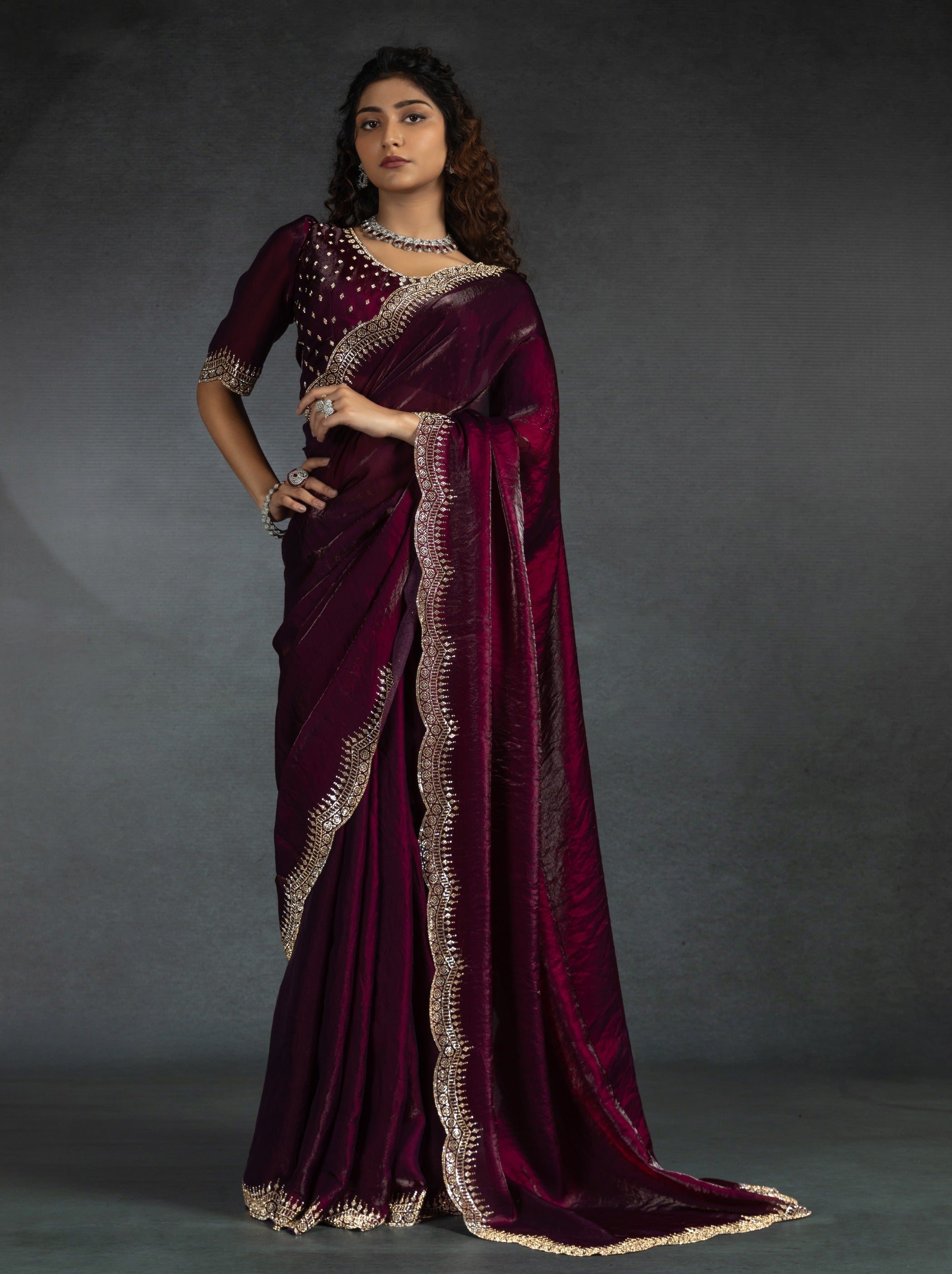 Wine Purple Satin Silk Party Saree Embellished With Zircon Handwork On Border - TrendOye