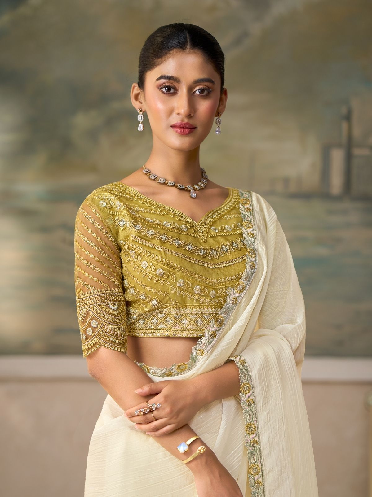 White Regal Embroidered Saree with Blouse Piece