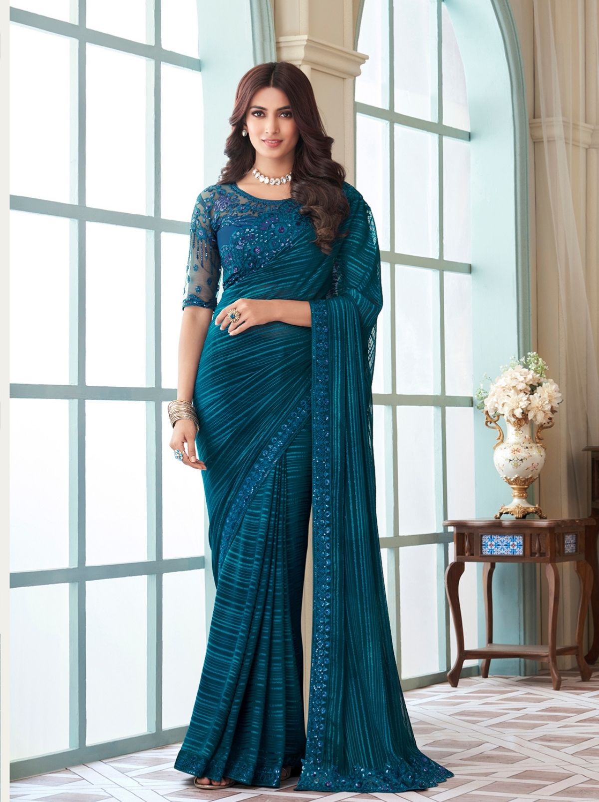Luxurious Green Premium Quality Weightless Designer Saree - TrendOye