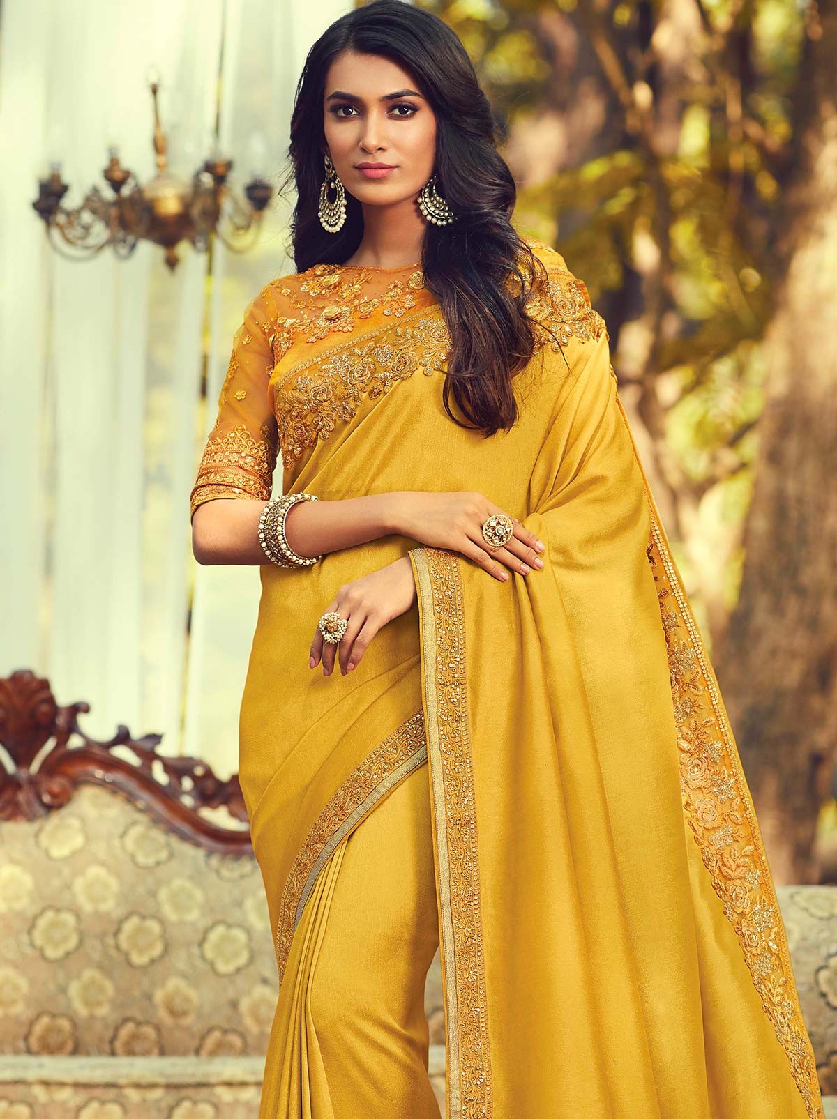 Gleaming Mustard Colored Designer Saree with Heavy Embroidered - TrendOye