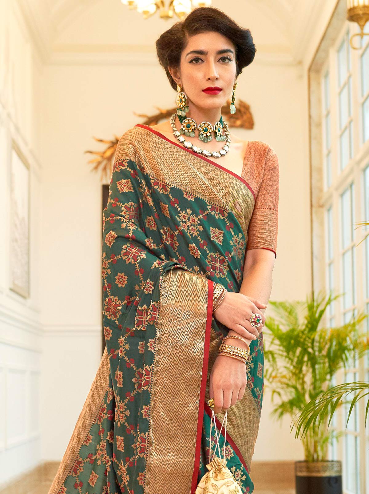 Gorgeously Green Patola Saree With Enchanting Gold Border - TrendOye