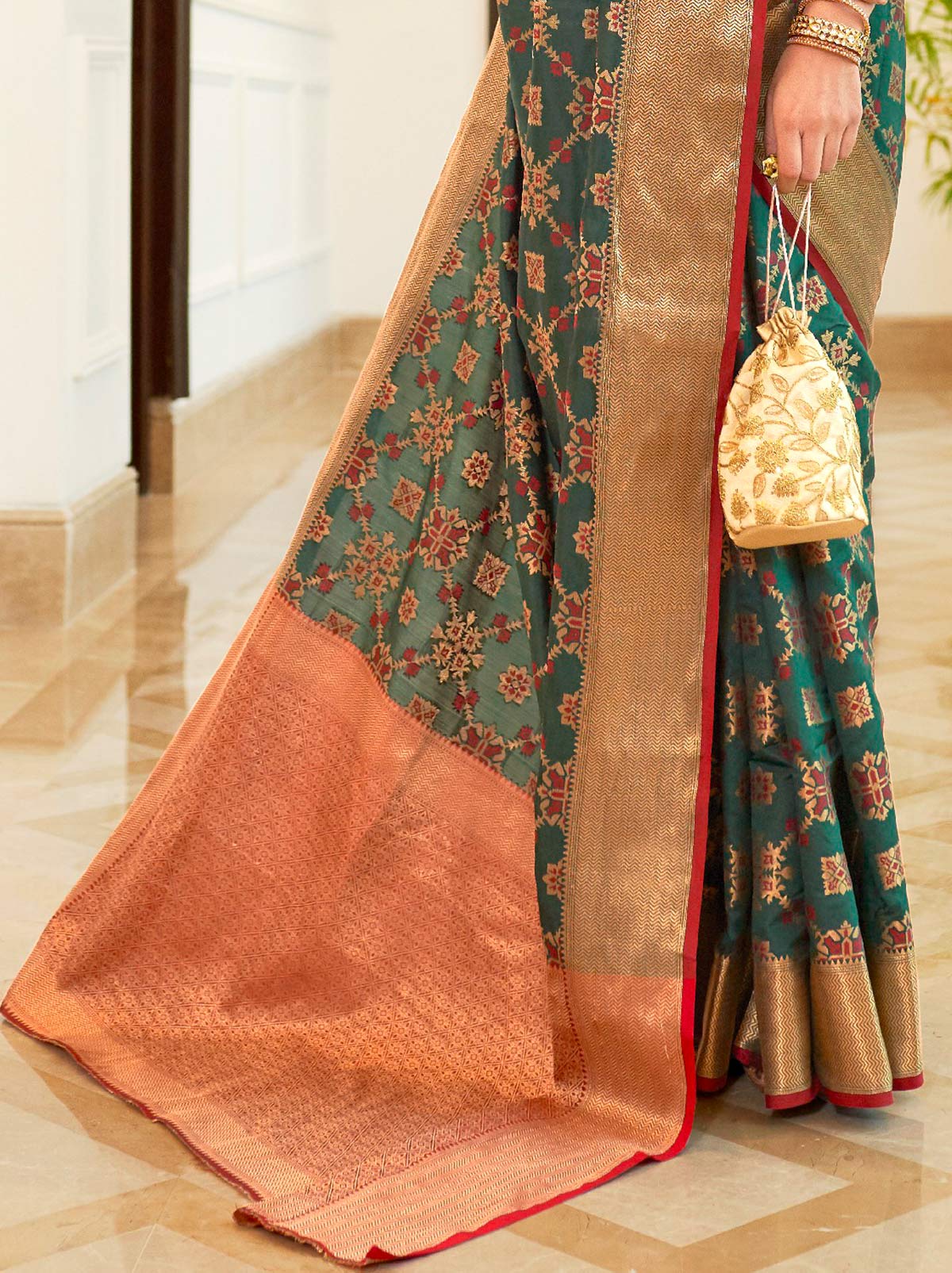 Gorgeously Green Patola Saree With Enchanting Gold Border - TrendOye