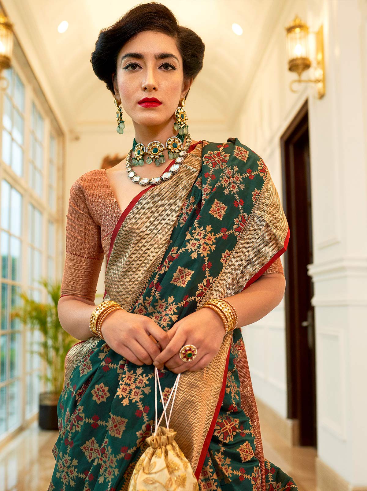 Gorgeously Green Patola Saree With Enchanting Gold Border - TrendOye