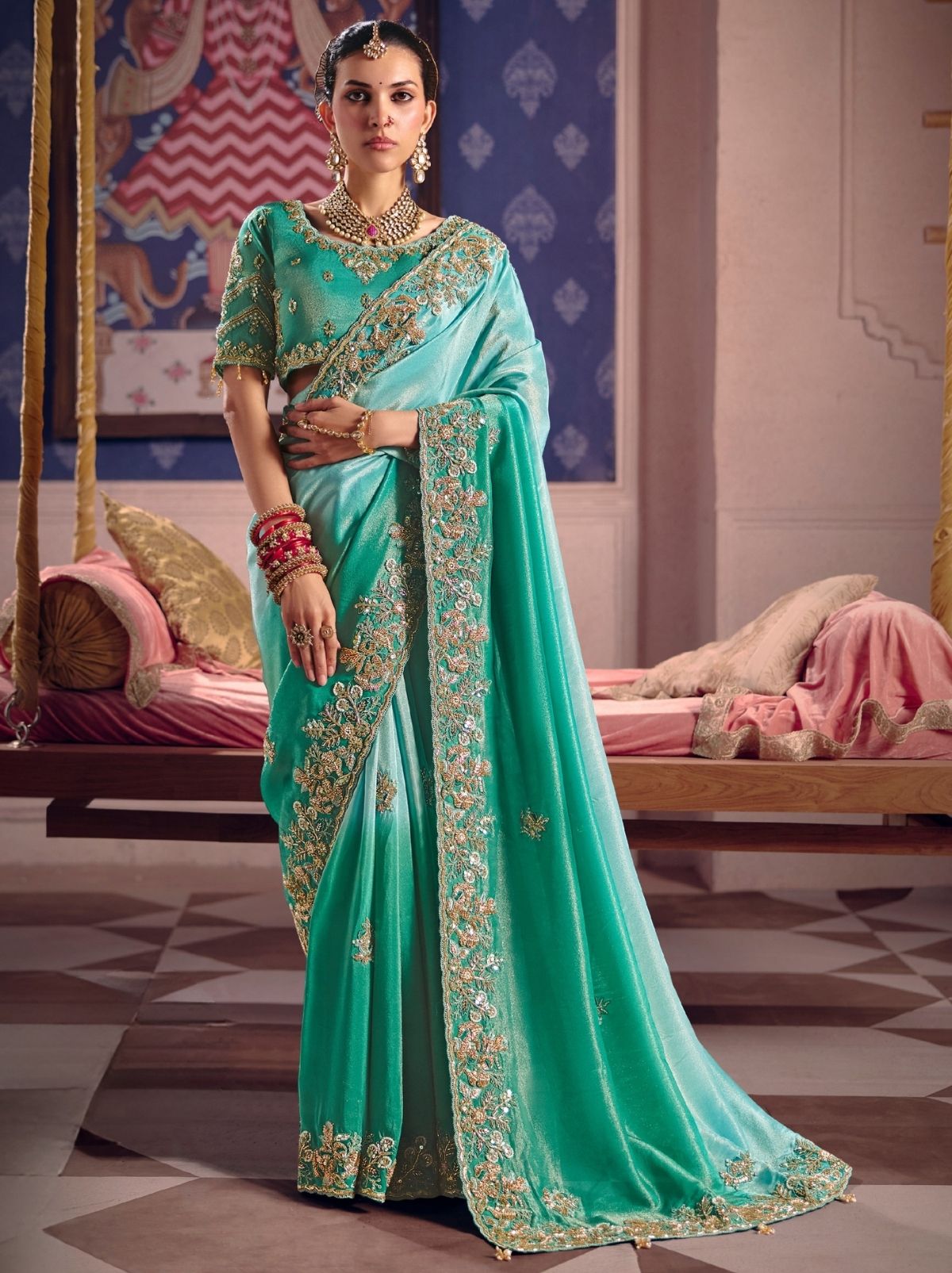 Turquoise Blue Tissue Silk Saree with Luxurious Zari & Embroidered Border