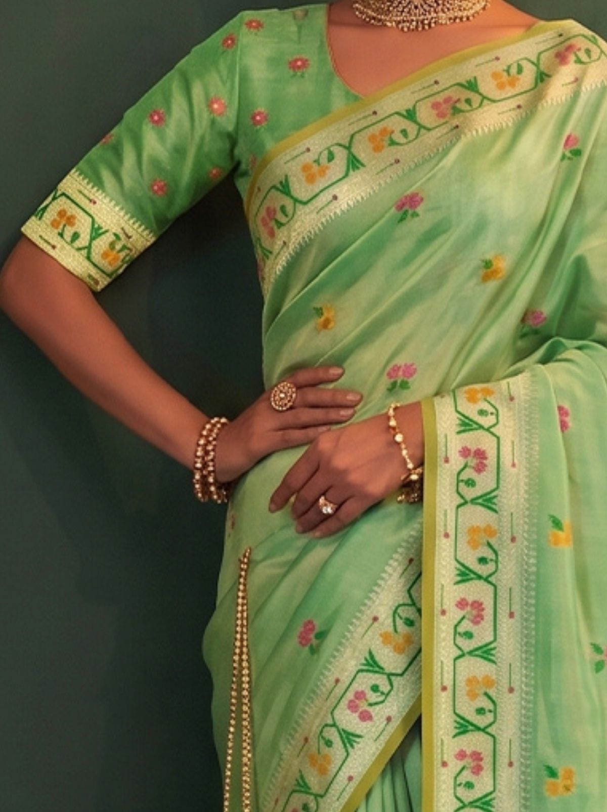 Pistachio Green Opulent Tissue Silk Saree with Soft Gold Zari Work