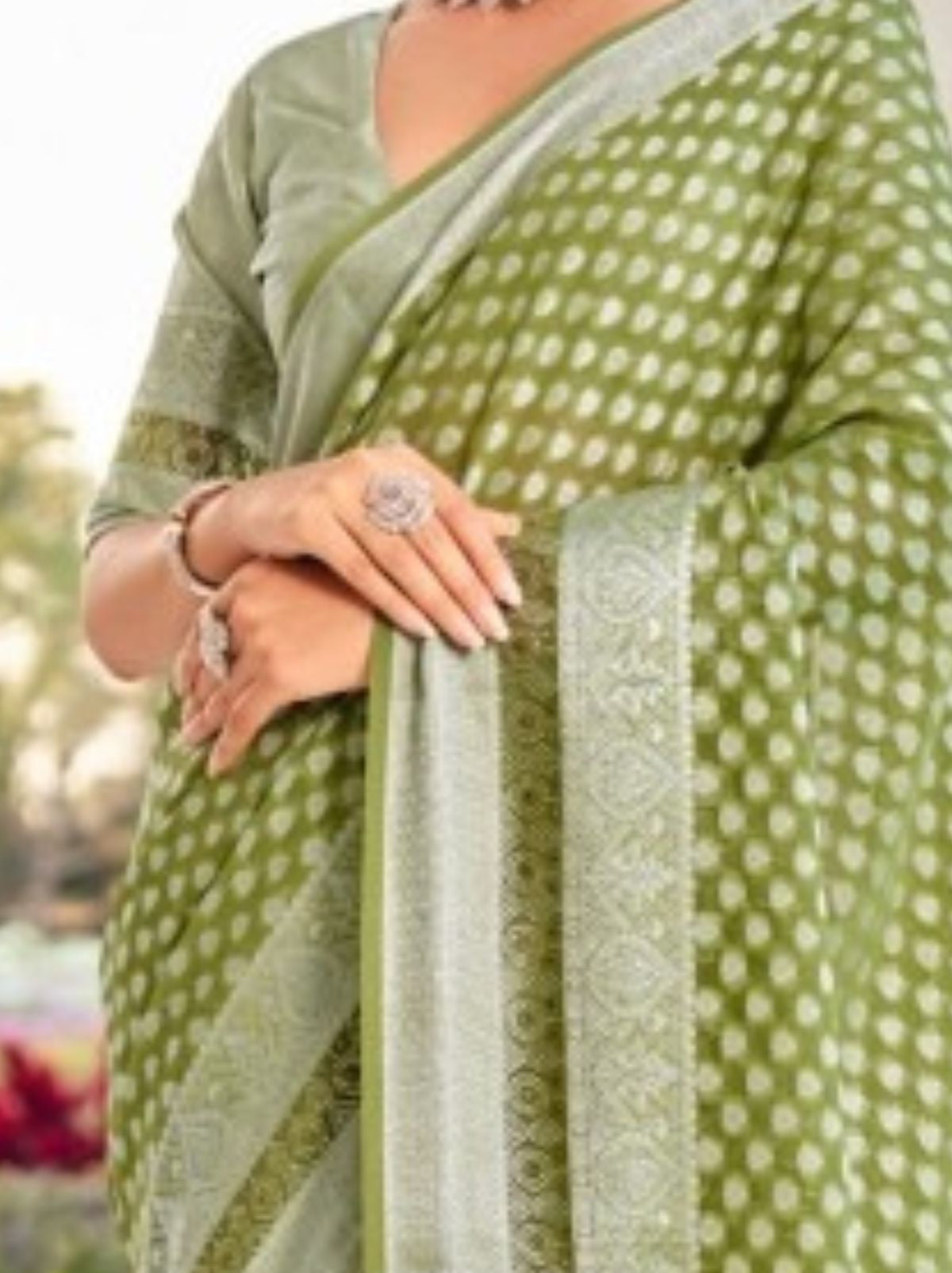 Moss Green Premium Georgette Saree With Weaved Motifs