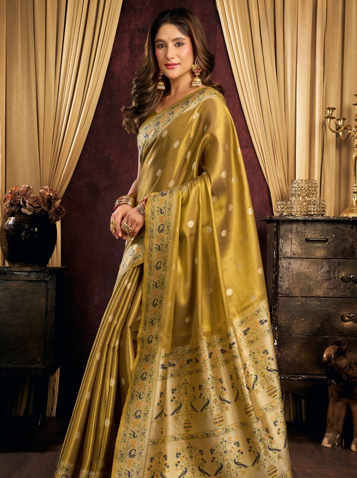 Olive Green Tissue Silk Saree with Soft Zari & Tassels