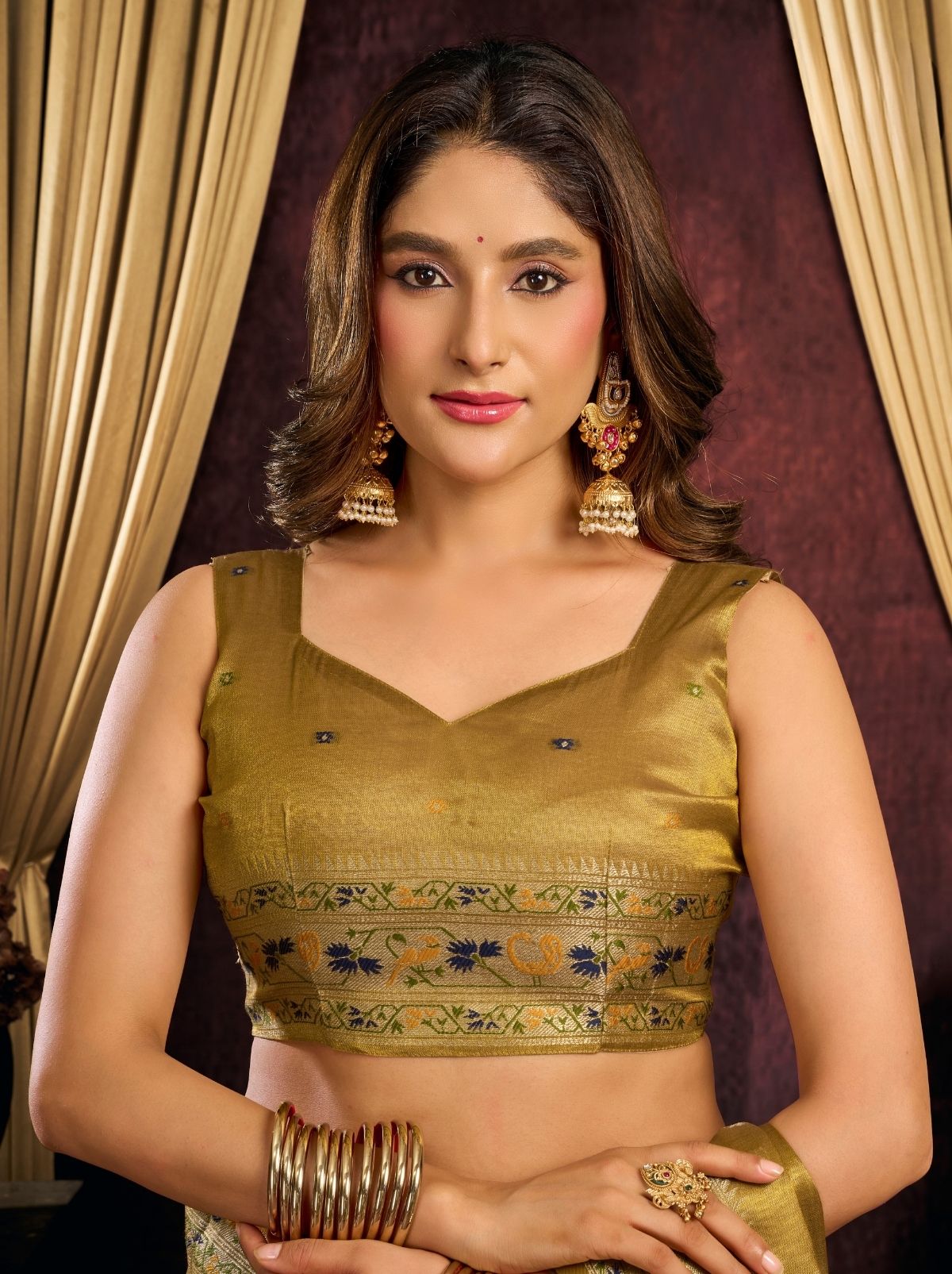 Olive Green Tissue Silk Saree with Soft Zari & Tassels