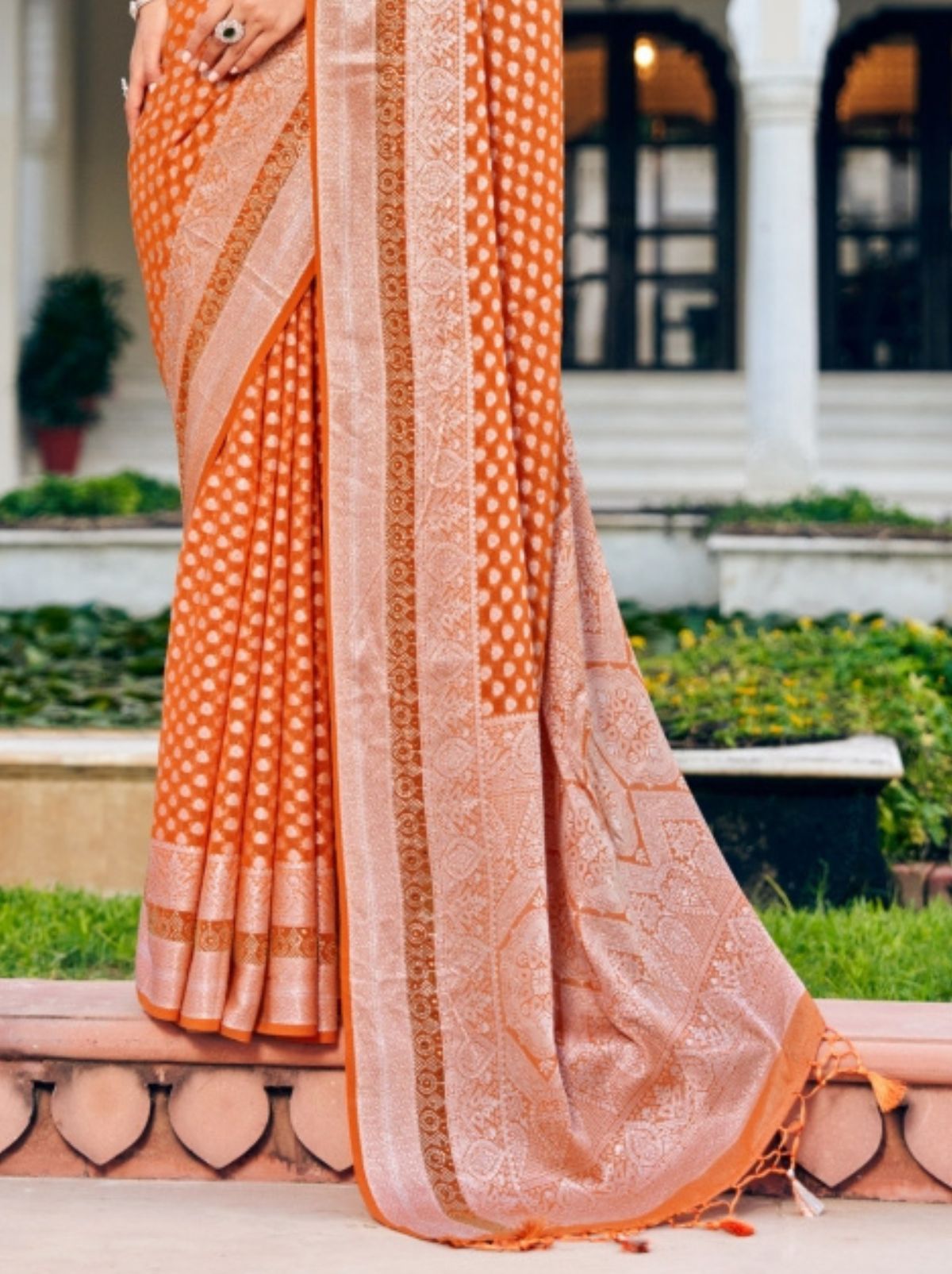 Carrot Orange Premium Georgette Saree With Weaved Motifs