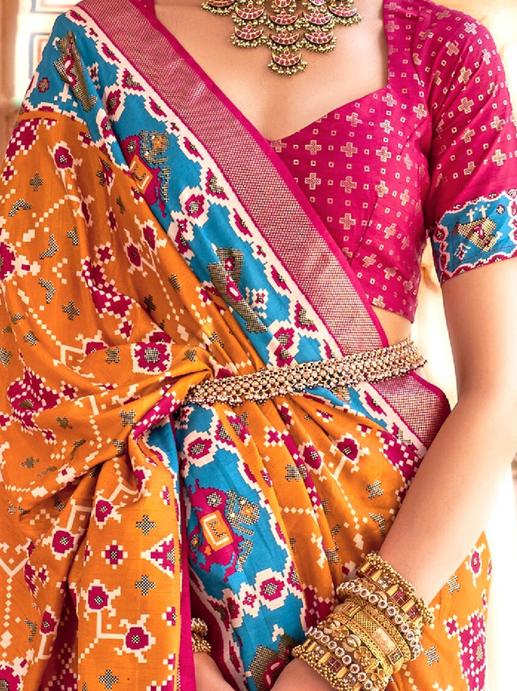 Carrot Orange Patola Festive Saree - TrendOye