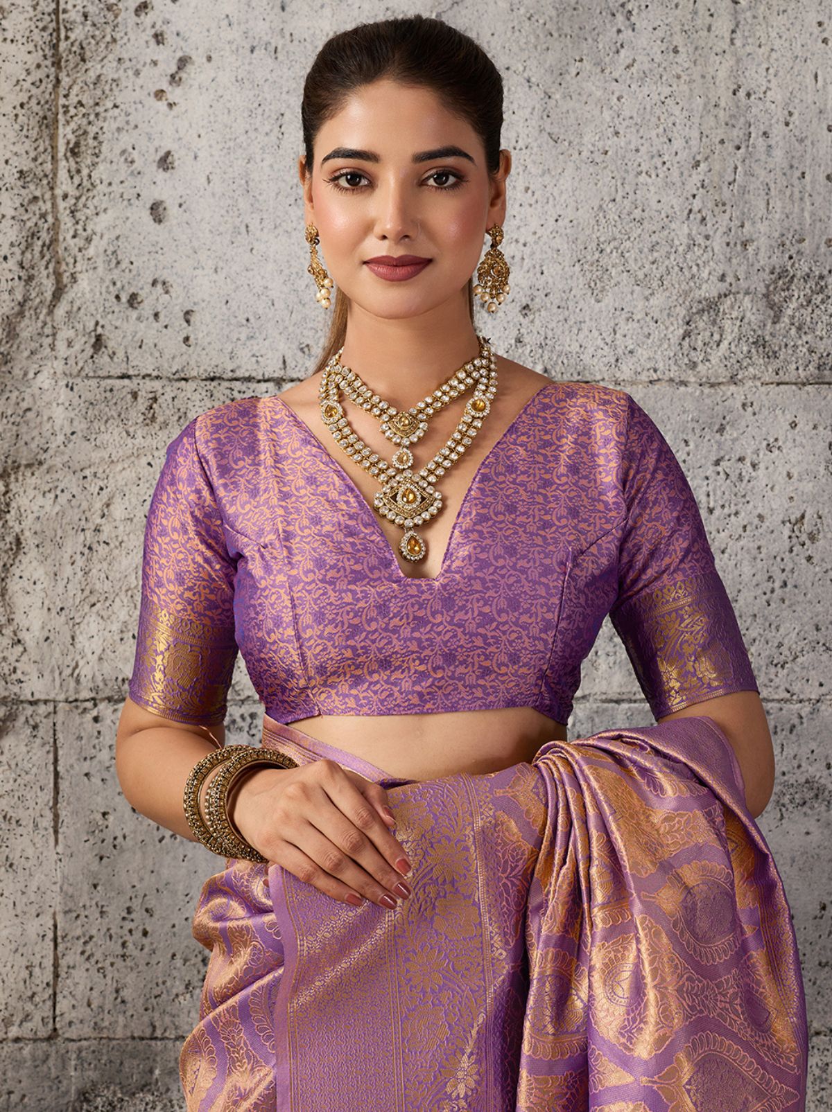 Plum Purple Kanjivaram Silk Saree With Intricate Gold Zari