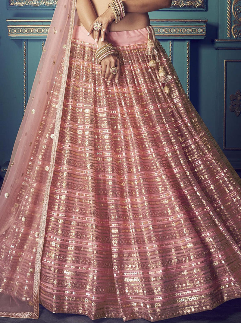 Pleasing Pink Colored Lehenga with infused beauty of sequins - TrendOye