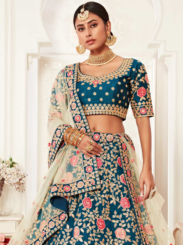 Eye Stunner Peacock Blue Lehenga With Golden and Pink Floral Embroidery - TrendOye