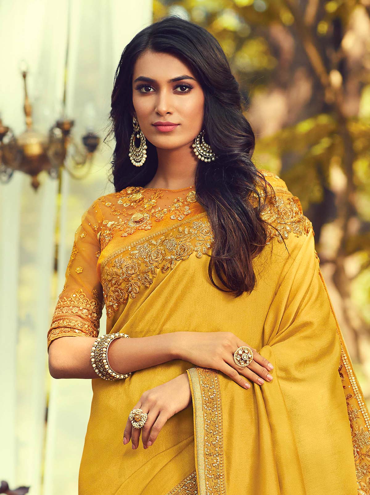 Gleaming Mustard Colored Designer Saree with Heavy Embroidered - TrendOye