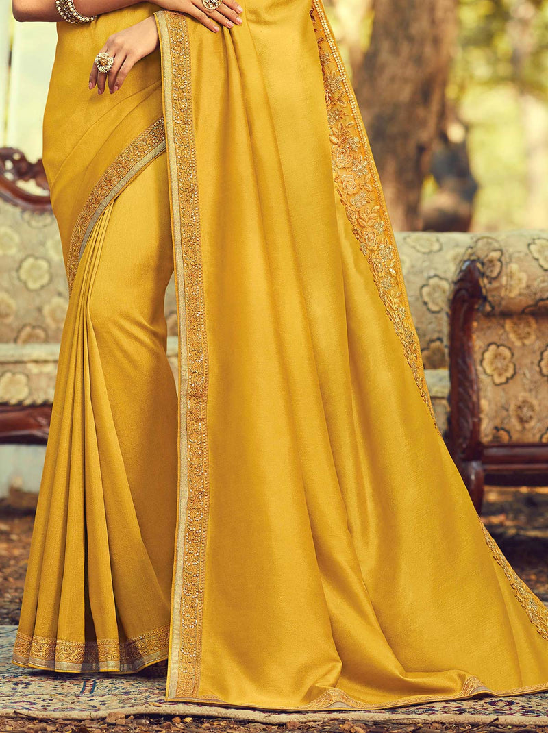 Gleaming Mustard Colored Designer Saree with Heavy Embroidered - TrendOye