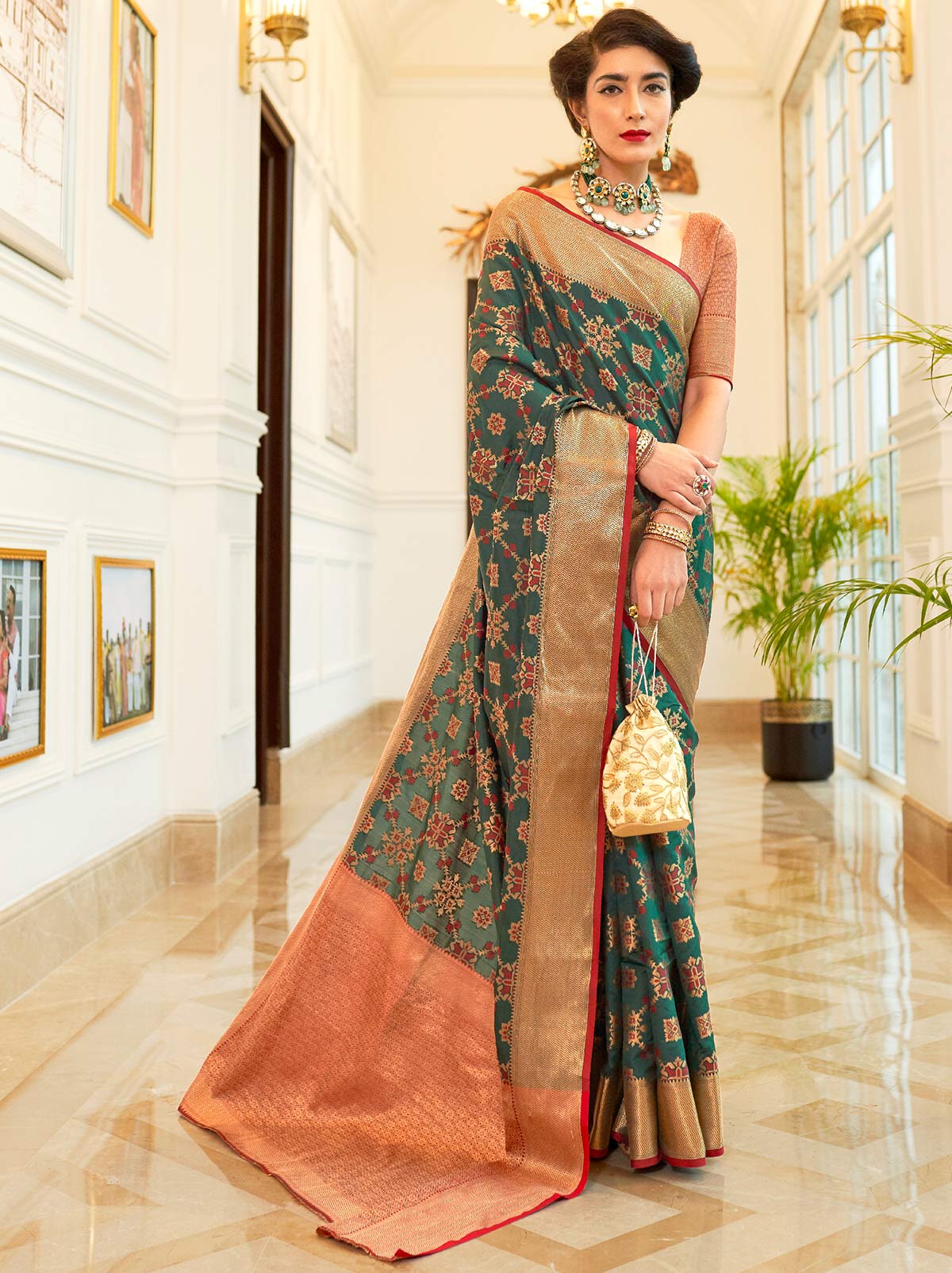 Gorgeously Green Patola Saree With Enchanting Gold Border - TrendOye