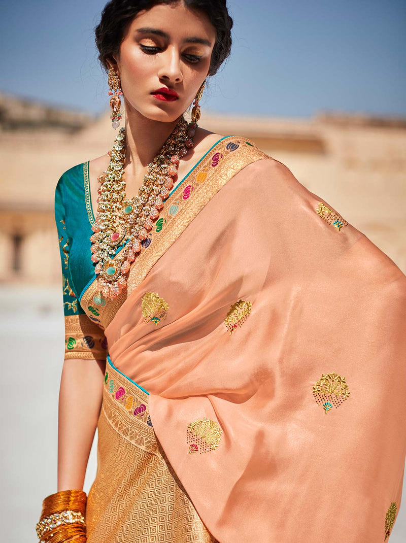 Feel That Beige Trendoye Saree With Peacock Blue Embroidered Blouse Fabric - TrendOye