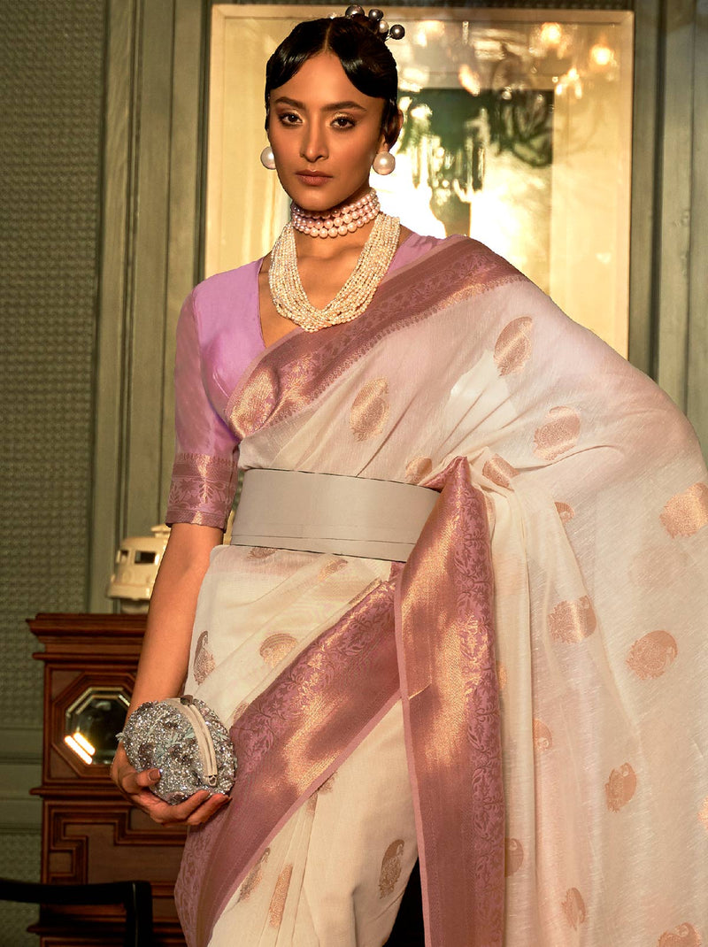 Striking vivid creme TrendyOye saree with artistry embeddings of copper zari design - TrendOye
