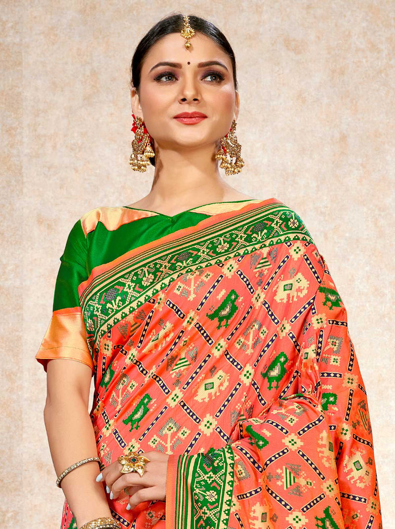 Delicately pink patola saree with floral and bird patterns - TrendOye