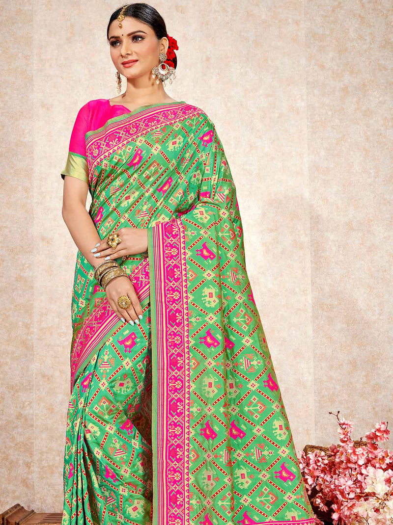 Vibrant and charming green patola saree - TrendOye